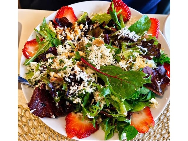Organic Garden Strawberry Salad with Jack Cheese & Walnuts.